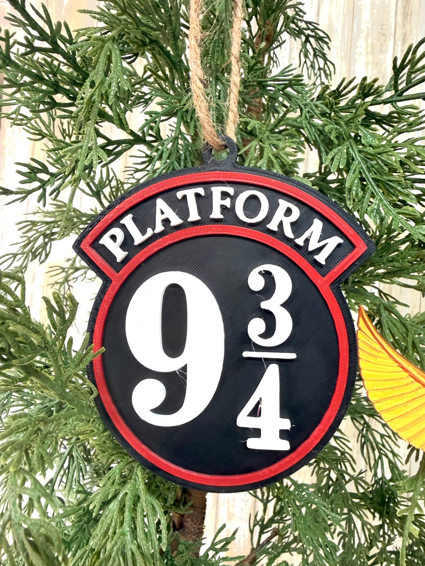 HP platform or snitch ornament 3D printed.