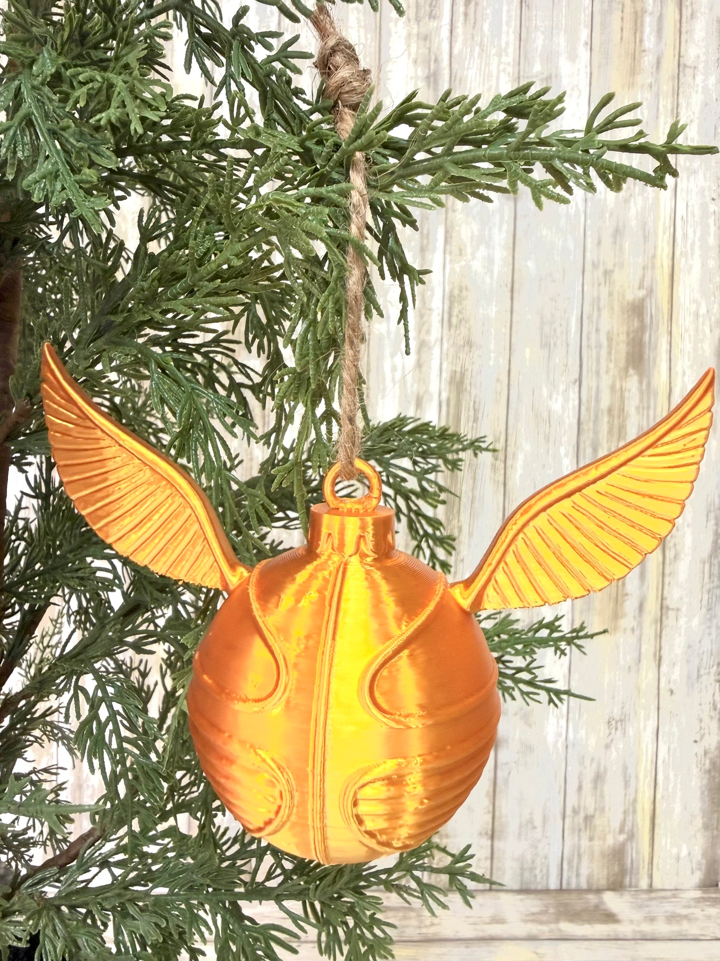 HP platform or snitch ornament 3D printed.