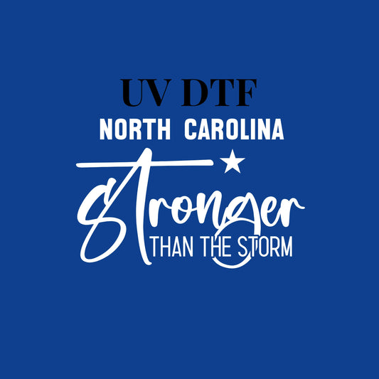 UV DTF Sticker print. North Carolina Stronger Than The Storm White Lettering decal permanent sticker. Uv wrap for glass can tumbler. #4287