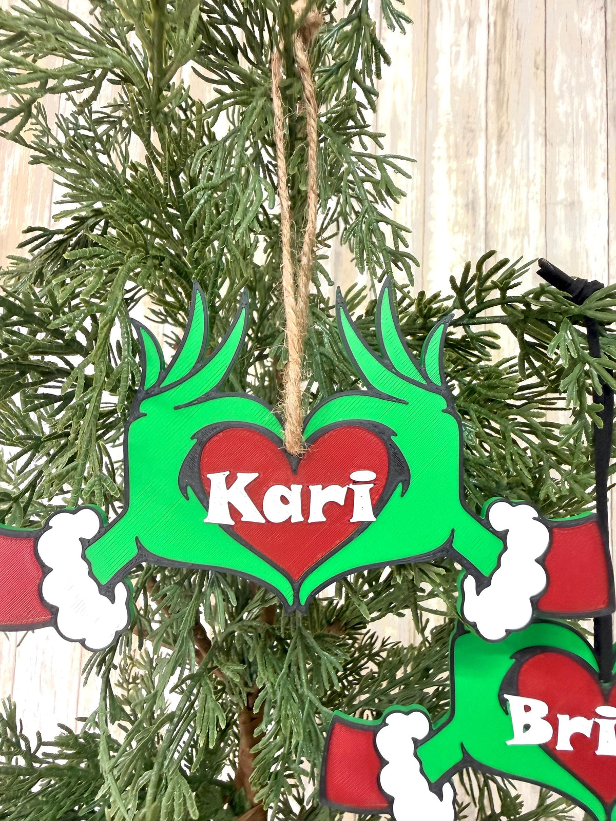 Personalized Green hands with heart ornament 3D printed.