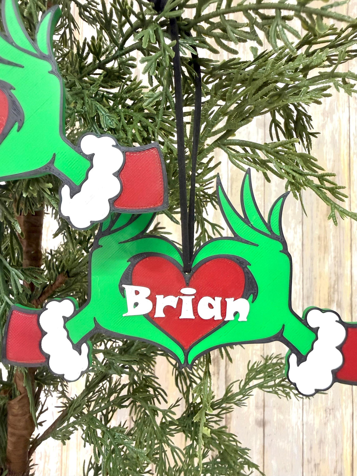 Personalized Green hands with heart ornament 3D printed.